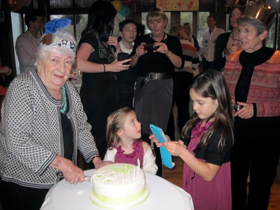 Nana cutting her 90th birthday cake at The Barnes, December 2011