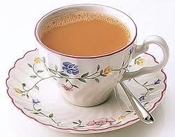 Love: Tea.... by the mug full... rarely a delicate cup & saucer!
