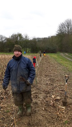 Each time I walk pass this hedge I am reminded of the day Errol helped plant it.