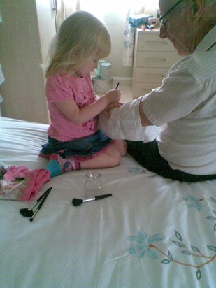 Aimee giving Grandad a new tattoo
