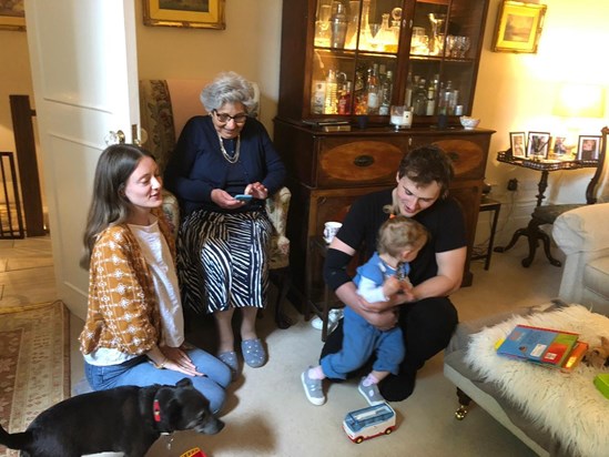 Enjoying special time with grandchildren and great grandchild