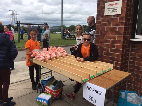 Tilly & Evie on the Pig Race stall