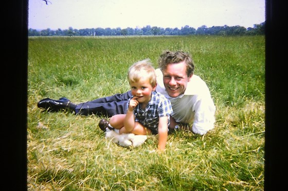 As a young boy with his Dad, John