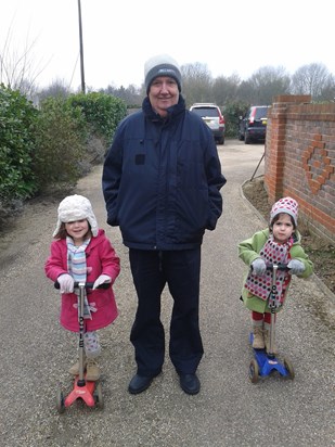 Going for a walk with his oldest granddaughters Evie and Sophia