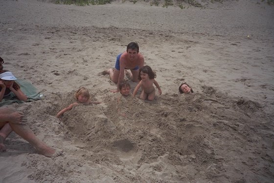 Burying children at the beach, with Megan, Andrew, Laura and Kate. Laura must have escaped.