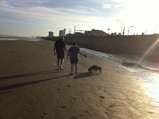 Bud, Jeneene and the dogs at the beach