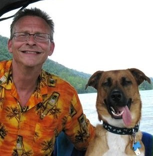 Cliff and Hunter enjoying a day on the boat