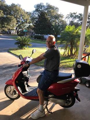 On his new scooter