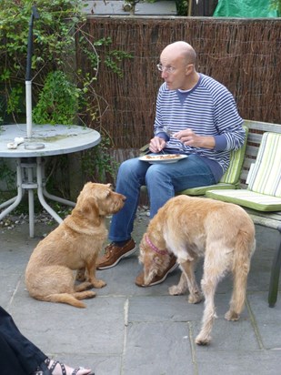 Jeff trying to eat a pizza in peace!!!!!