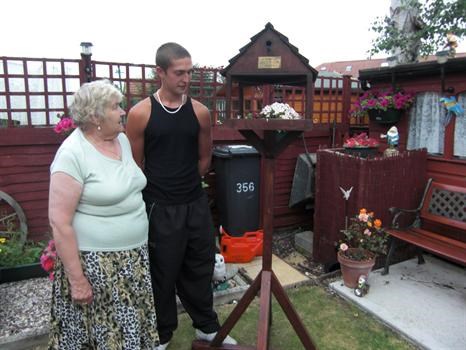 Dale & Grandma with the bird table he made in memory of his Grandad
