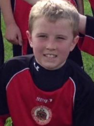Jack in his Newcastle under Lyme Junior School rugby kit