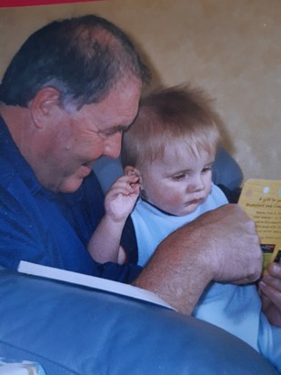 Reading to Mitch as a baby20210519 170735