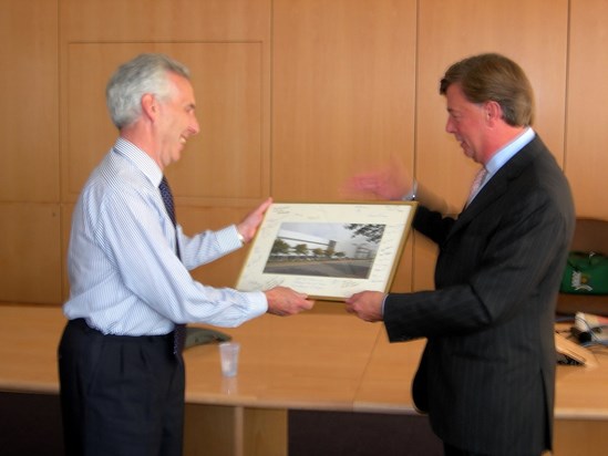 Terry on his retirement from Genzyme receiving a presentation from Henri Termeer CEO