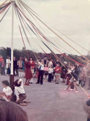 Mrs Gretton adjusting the maypole ribbons. Approx 1971/2
