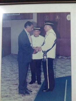 father receiving his ADK, 1993