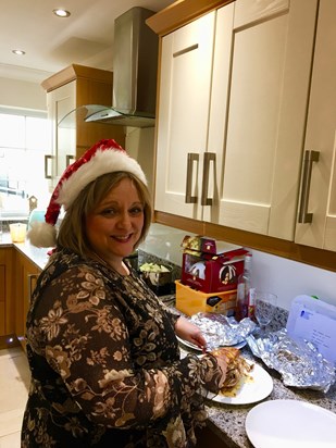 Mum cooking her legendary Christmas Roast xx