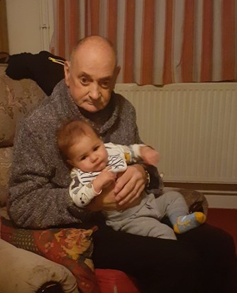 Dad with his great nephew Zakaria, just before he bit him.