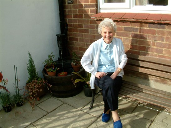  Gladys sitting by back door, 2003