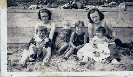 My mom with her younger siblings - she is on the far left with Loretta on her lap. Her sister Francis on the far right with Bud on her lap and Betty and Skook in the middle.