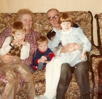 May & Jim with three of their grand children
