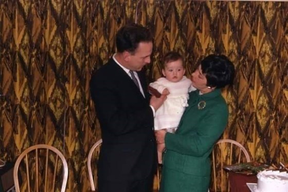 Mom, Dad and a very small me