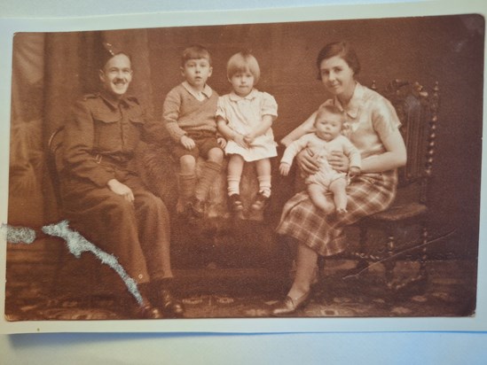 Bill in 1941 with parents Gordon and Clara , younger sister Eileen and brother Dennis.