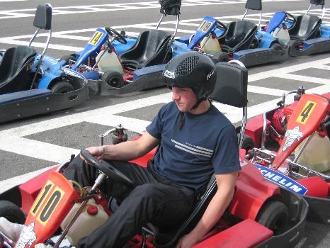 about to set a new lap record and brake the go-kart at the same time