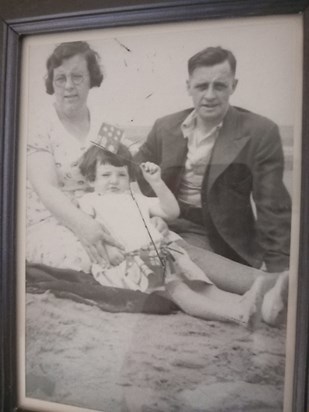 A young Alice with her Mum and Dad.  Recently added to my photo wall ❤️