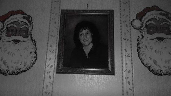 Carol's memorial portrait at her parents house