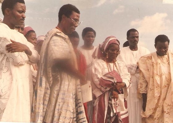 At his mother's burial in 1986