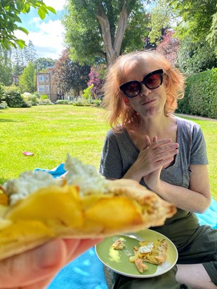 Claire enjoying a homemade potato galette in her and Cat’s garden (2020)