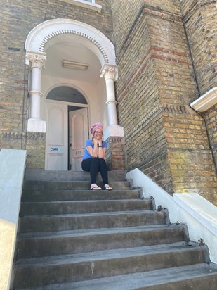 Claire on the steps of her and Rob’s flat on her birthday (2020)
