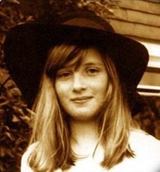young diana in a hat