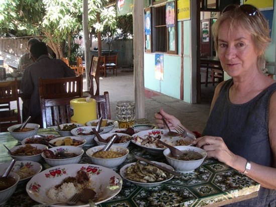 Mum trying a bit of everything in Pagan, Burma, 2003