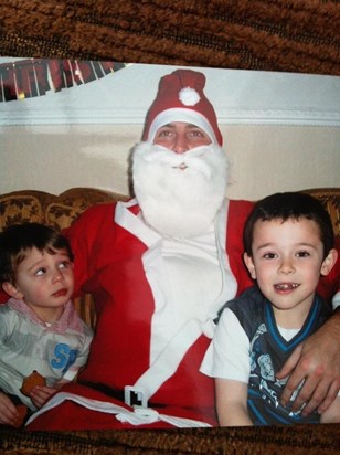 Christmas 2009. Santa Adam with Owen and Ryan