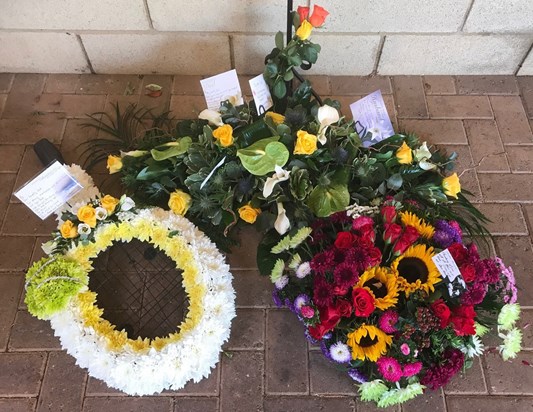 Floral tributes for John Beamish