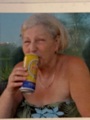 Nana G enjoying a nice cold beer in the sun