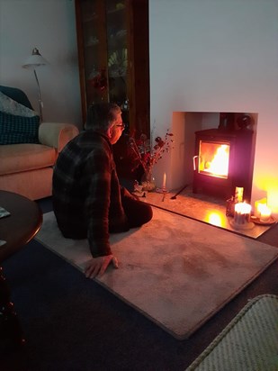 Dad in front of the fire 2022