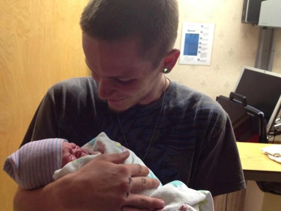 Dalton holding his nephew Jacksyn Rory