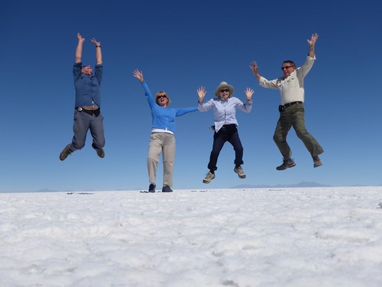 Jumping for joy on Bolivian salt lake