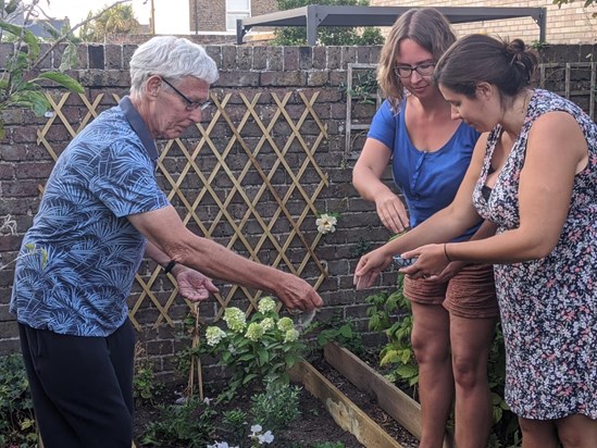 Scattering Marilyn's ashes in her tribute flower bed (Deal, Kent)