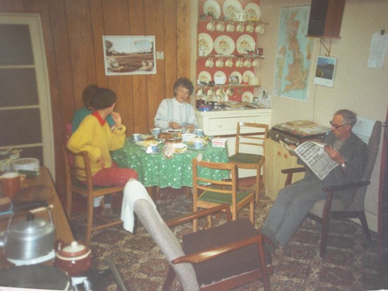 Teatime in the kitchen Lodge Farm. Dad reading the Western Daily - Great headline! Rocking chair centre stage.