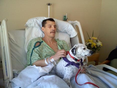 Daniel in Hospice with therapy dog - Jan. 27, 2011
