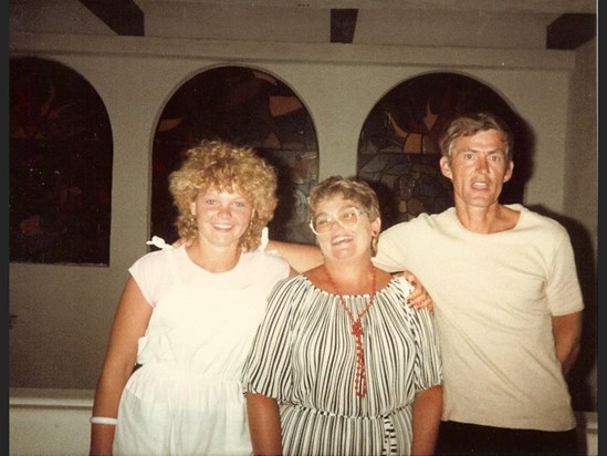 Me, mum and dad on holiday (there’s that funny face pulling again dad!) 😆