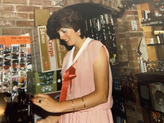 Maureen behind the bar in the Colkirk Crown