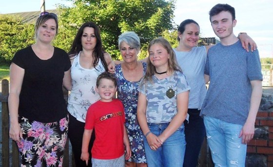Mum with all her children and 2 grandchildren