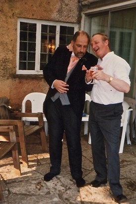 John blagging a drink after his swim from the brides uncle.