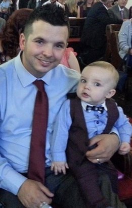 Michael with Logan on his Christening Day 