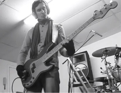 Ian Leaf displays shrewd use of fingerless gloves, whilst recording bass for My Attorney's Panama.