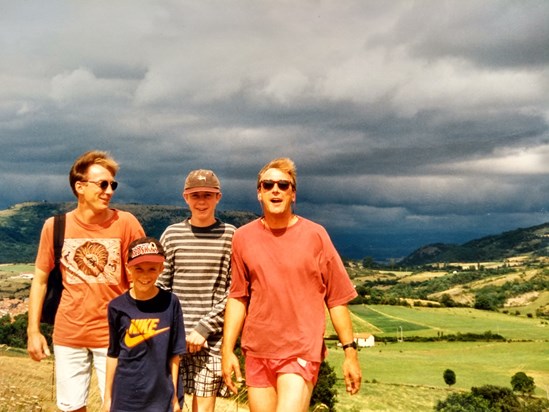 Paul with Dad, Eoin and uncle Fintan down in central France, with a storm on the horizon! July 1995